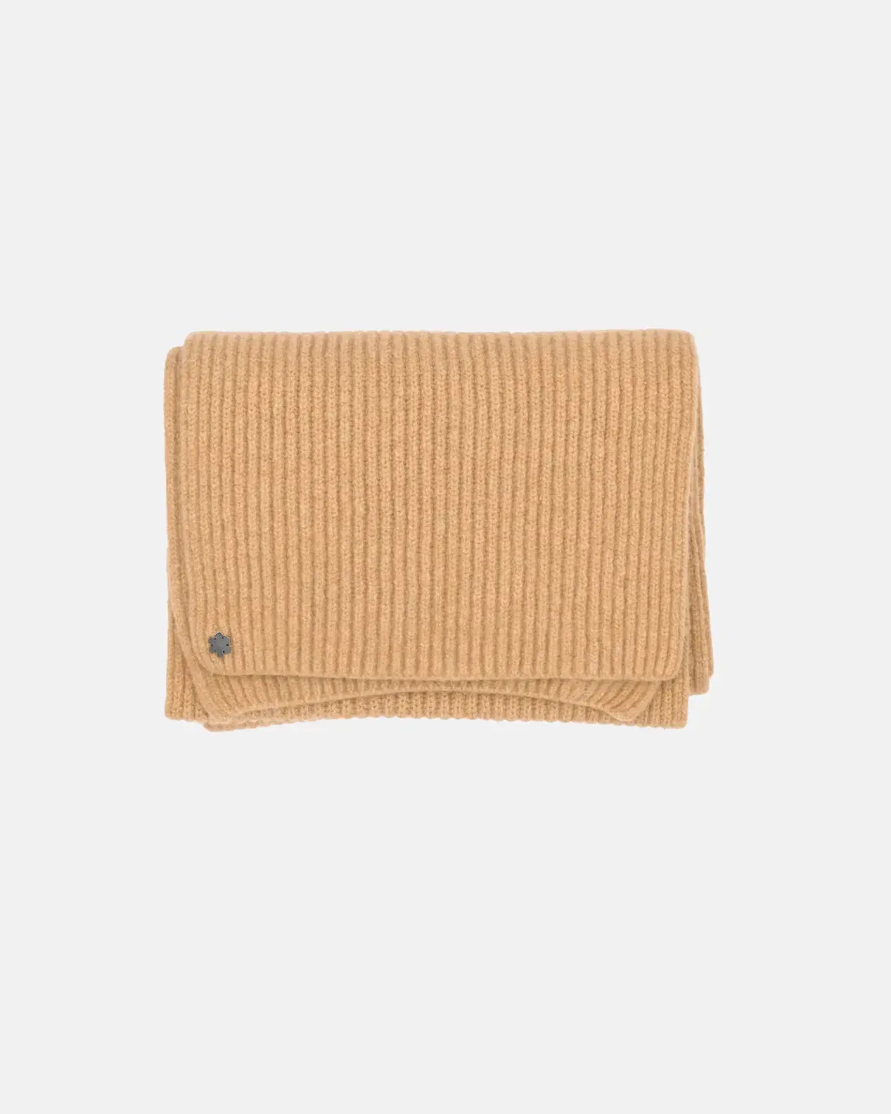 The Alex Scarf in the colour camel adorned with a hematit-plated Kalmus flower in one corner.