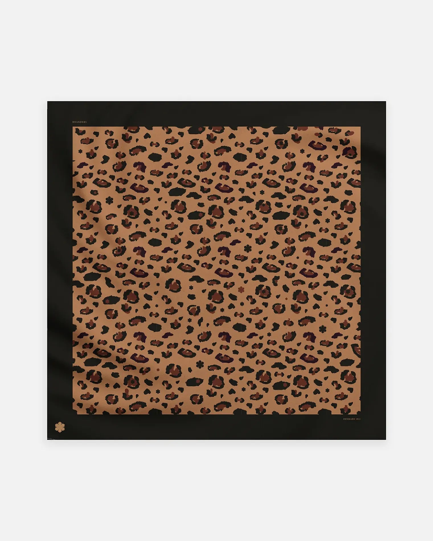 The Alfi Scarf from RHANDERS in the colour black / leo with a Kalmus and leopard pattern.