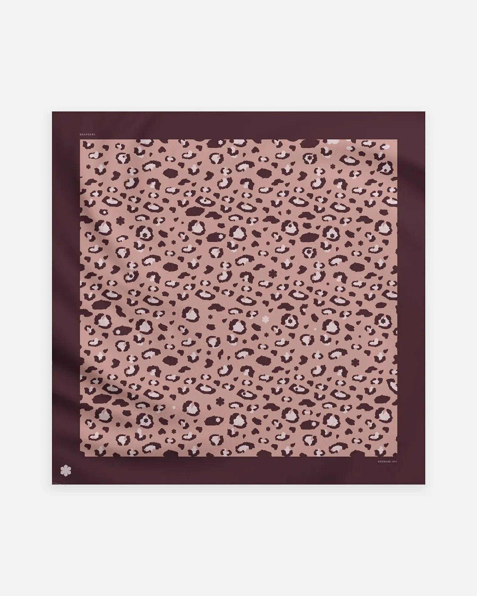 The Alfi Scarf from RHANDERS in a rose and plum colour way with a Kalmus and leopard pattern.