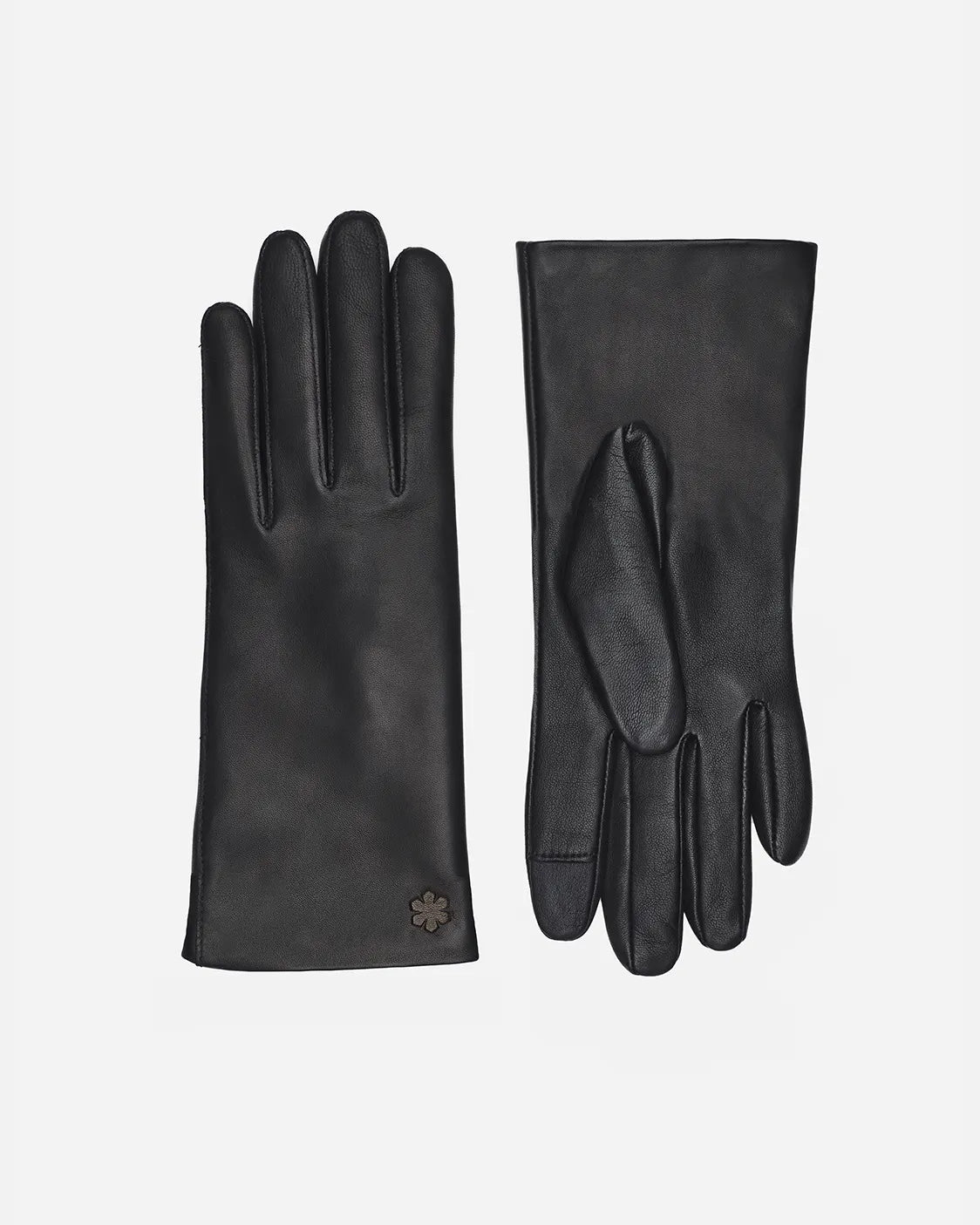 Alma is an elegant glove for everyday wear. Crafted from the finest lamb leather, adorned with an embossed Kalmus flower and touch technology from RHANDERS.