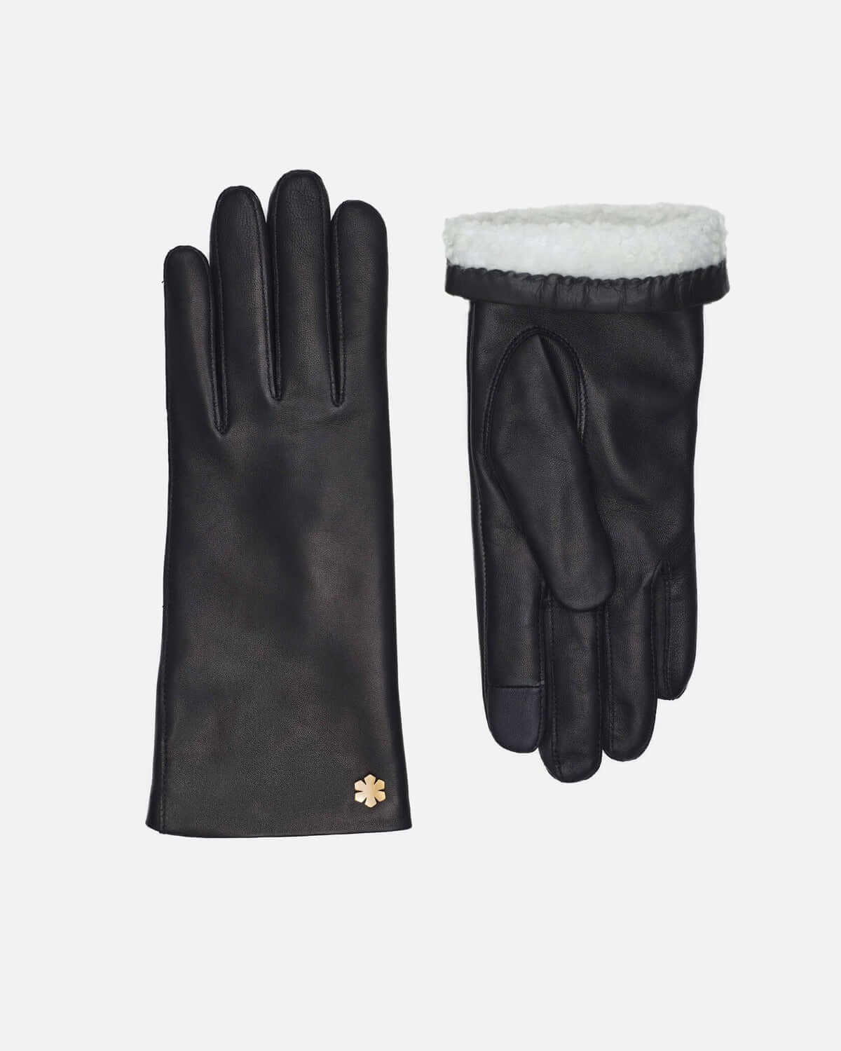 Warm female leather glove with soft curly slink lining and touch from RHANDERS.