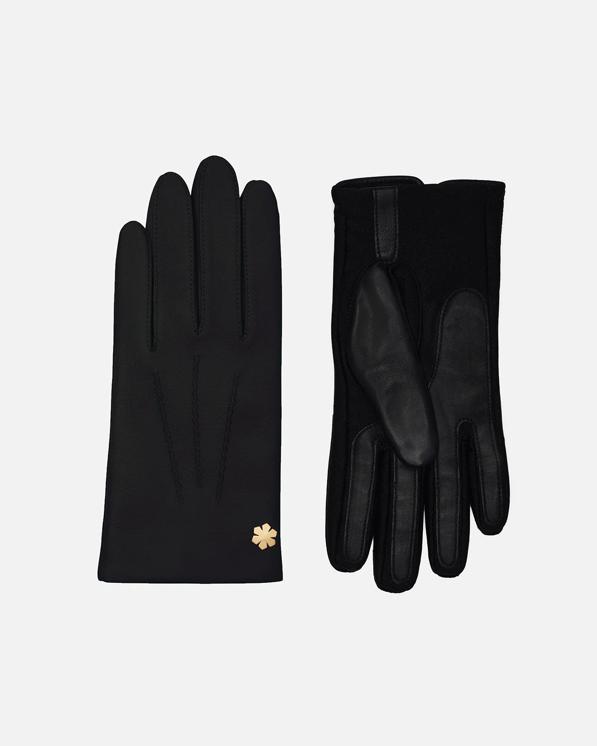 The women’s glove Cordelia One-size from RHANDERS is both elegant and classic, yet with a touch of modern technology and a one-size fit embedded in the palm.