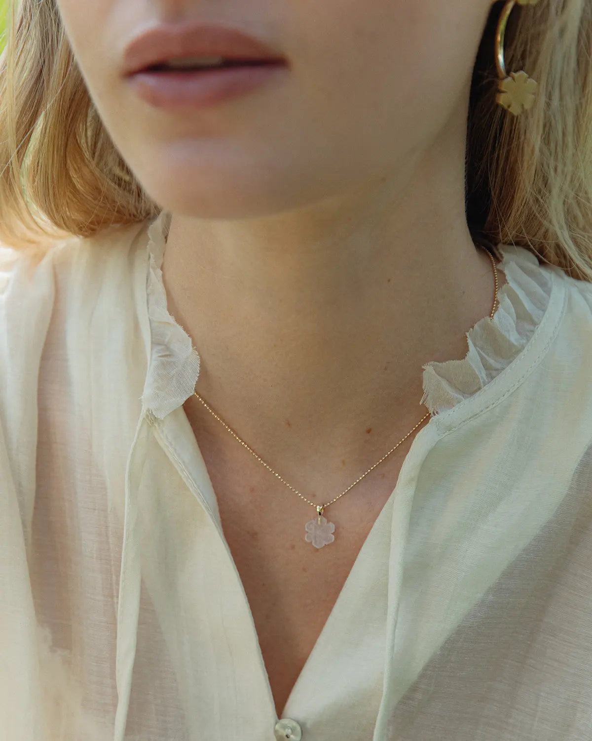 The Crystal Kalmus Necklace from RHANDERS is designed in our atelier in Denmark. The Kalmus takes shape in rose quartz crystal stone - the crystal of love.