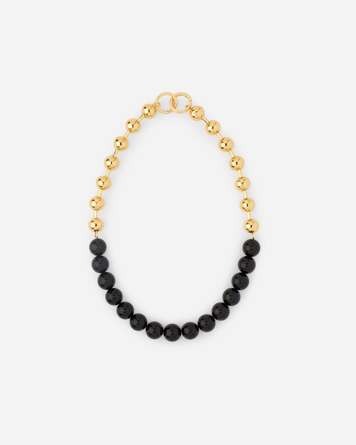 Crystal Pearl Necklace from RHANDERS is designed in our atelier in Randers, Denmark. The necklace is crafted in the black agate crystal stone with a RHANDERS-logo clasp.
