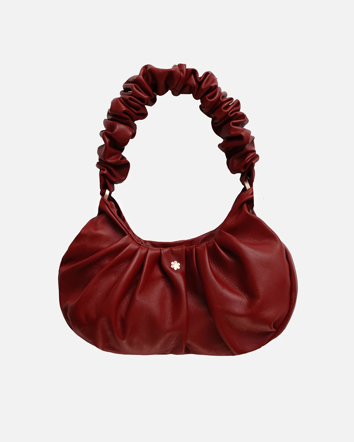 Red elegant bag from RHANDERS in a Baguette silhouette. 14K goldplated details. Lamb leather and buttersoft