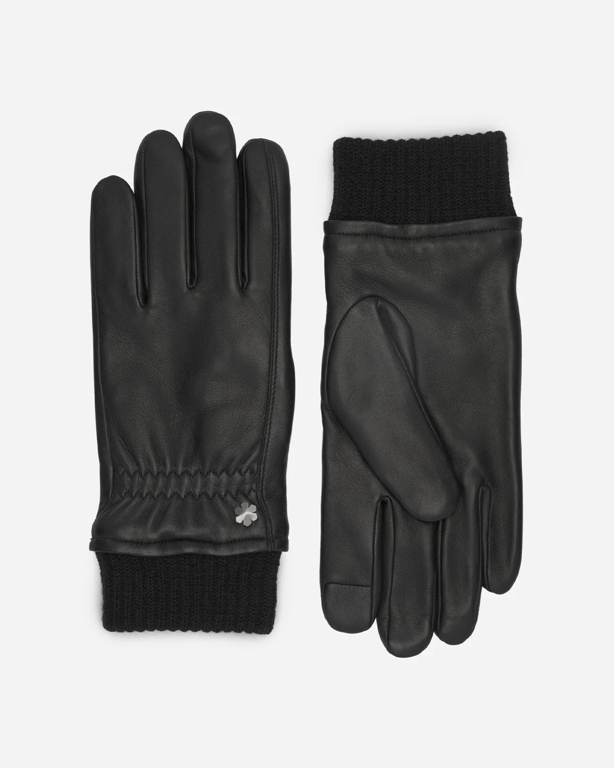 The sporty and strong gloves for men, Harry, from RHANDERS, are crafted from lamb leather with micropile and fleece lining to keep you warm, and adorned with a hematite-plated Kalmus flower.