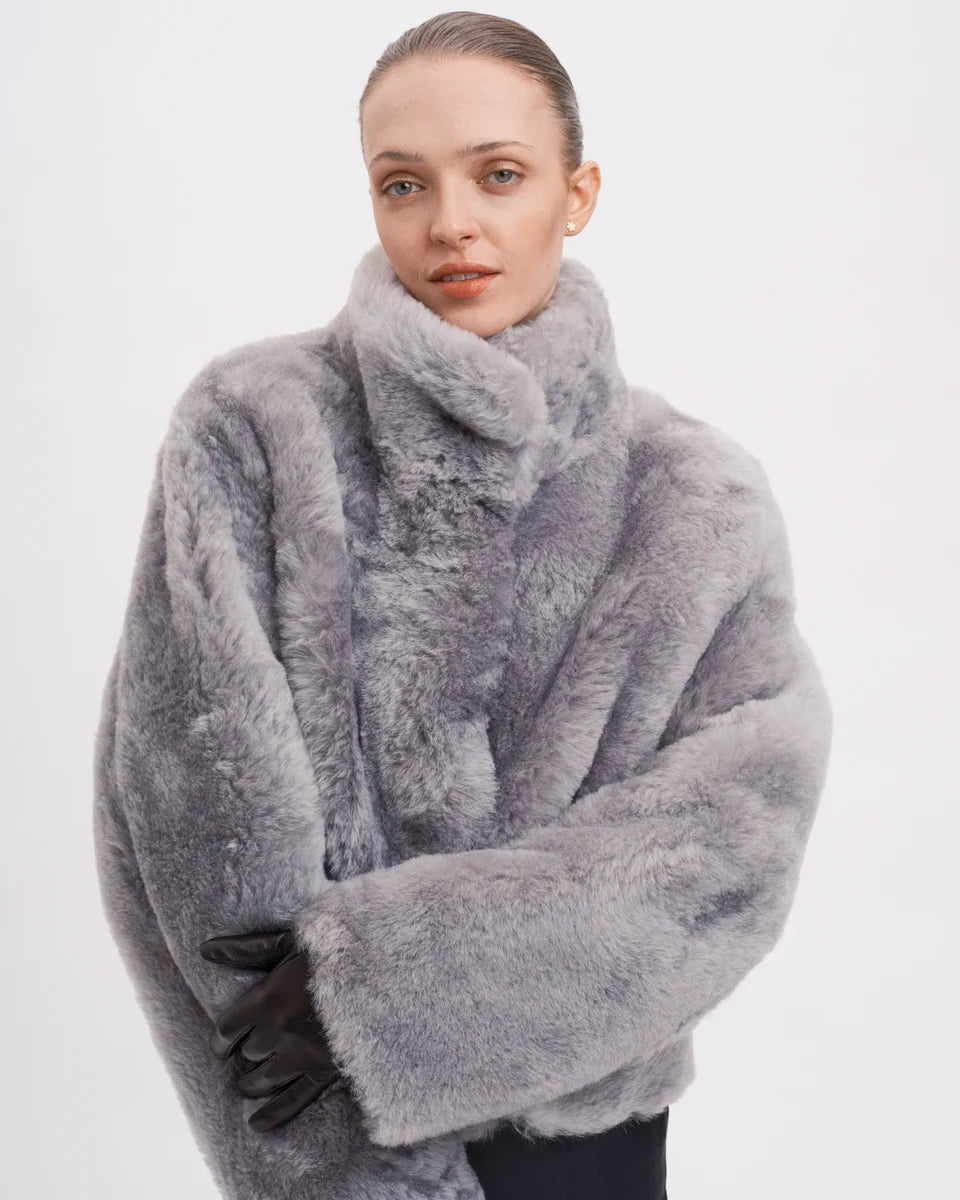 The Helena Jacket from RHANDERS is handcrafted from the luxurious quality Icelandic double-face long-haired lamb - soft long wool on one side and velvet soft suede on the other side.