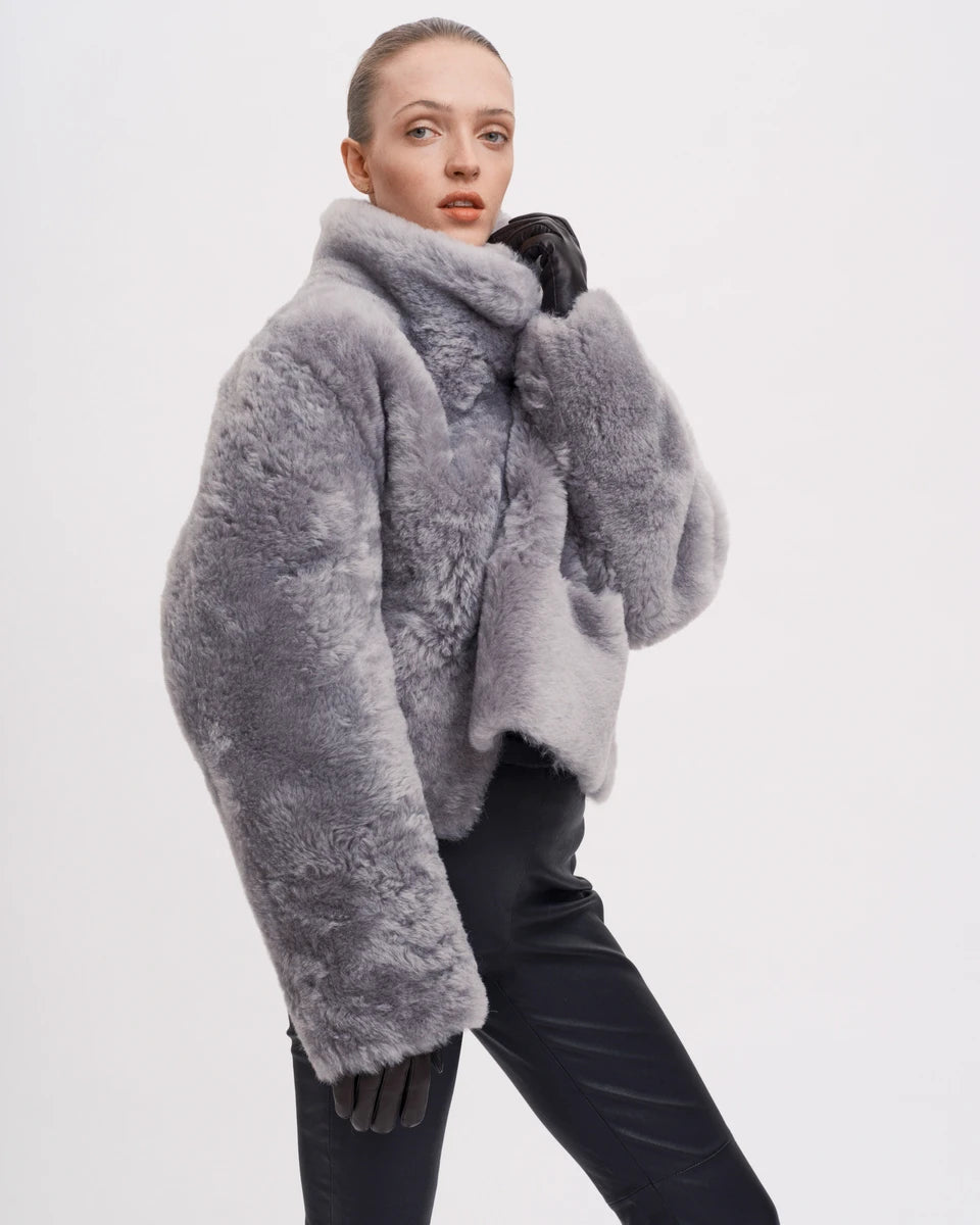 The Helena Jacket in the colour grey is crafted in a reversible design - creating two jackets in one.