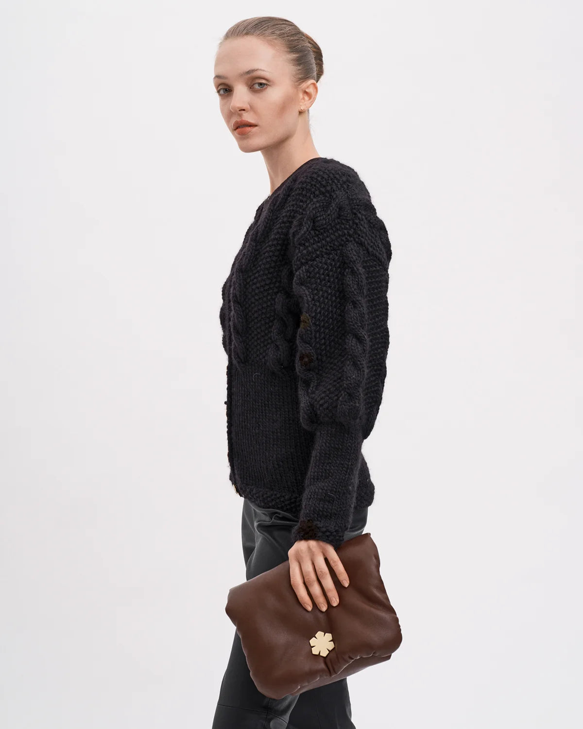 Handcrafted bag made from soft lamb glove-leather in a smoothing chocolate colour from RHANDERS.