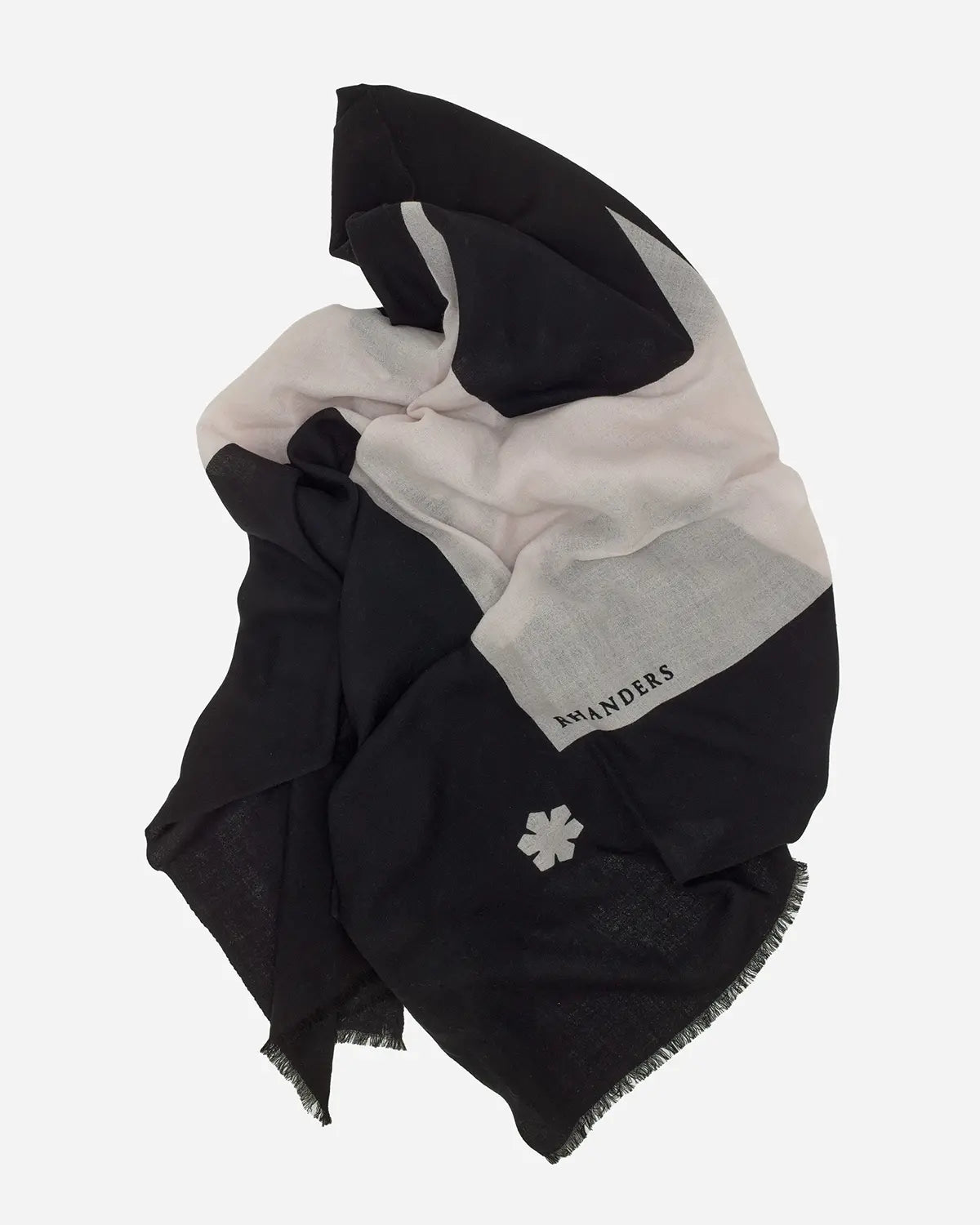 The Adora Scarf measures 145 x 145 cm.