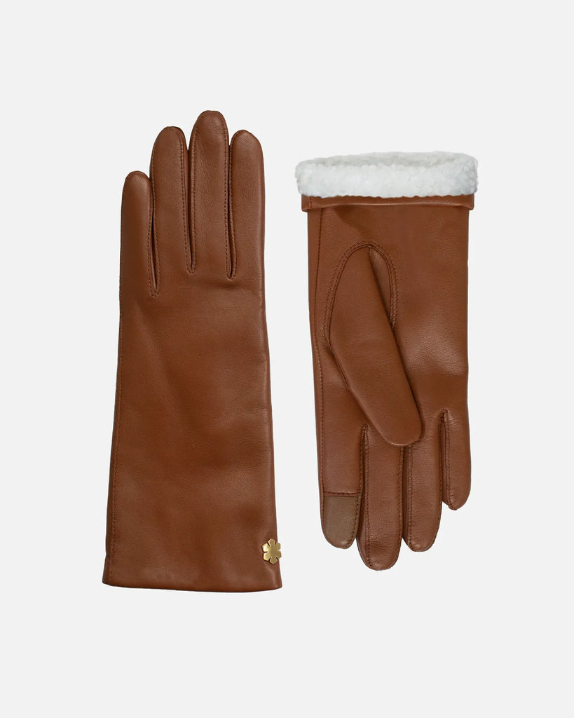 Warm female leather glove, in the colour cognac, with soft curly 'pearl' lamb lining and touch from RHANDERS