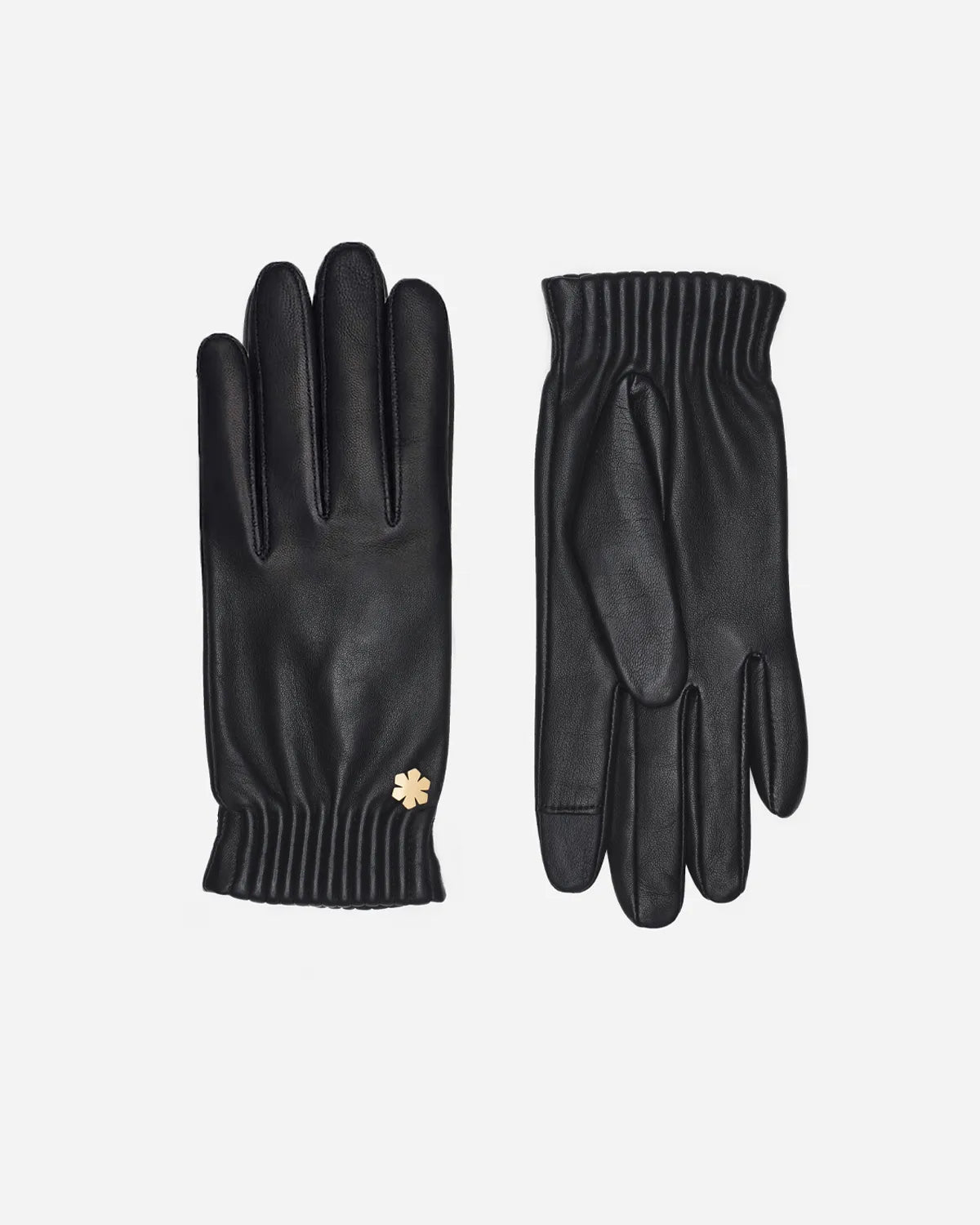Timeless and elegant women’s glove from RHANDERS crafted from the finest lamb leather in a beautiful black colour with a 14 karat gold-plated Kalmus flower.