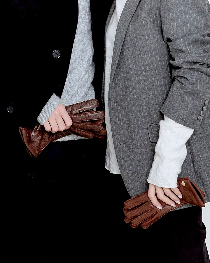 Our premium women’s gloves from RHANDERS, the Anastasia Pearl, is crafted from the butter-soft and most exclusive peccary leather with a warm and curly slink lining.