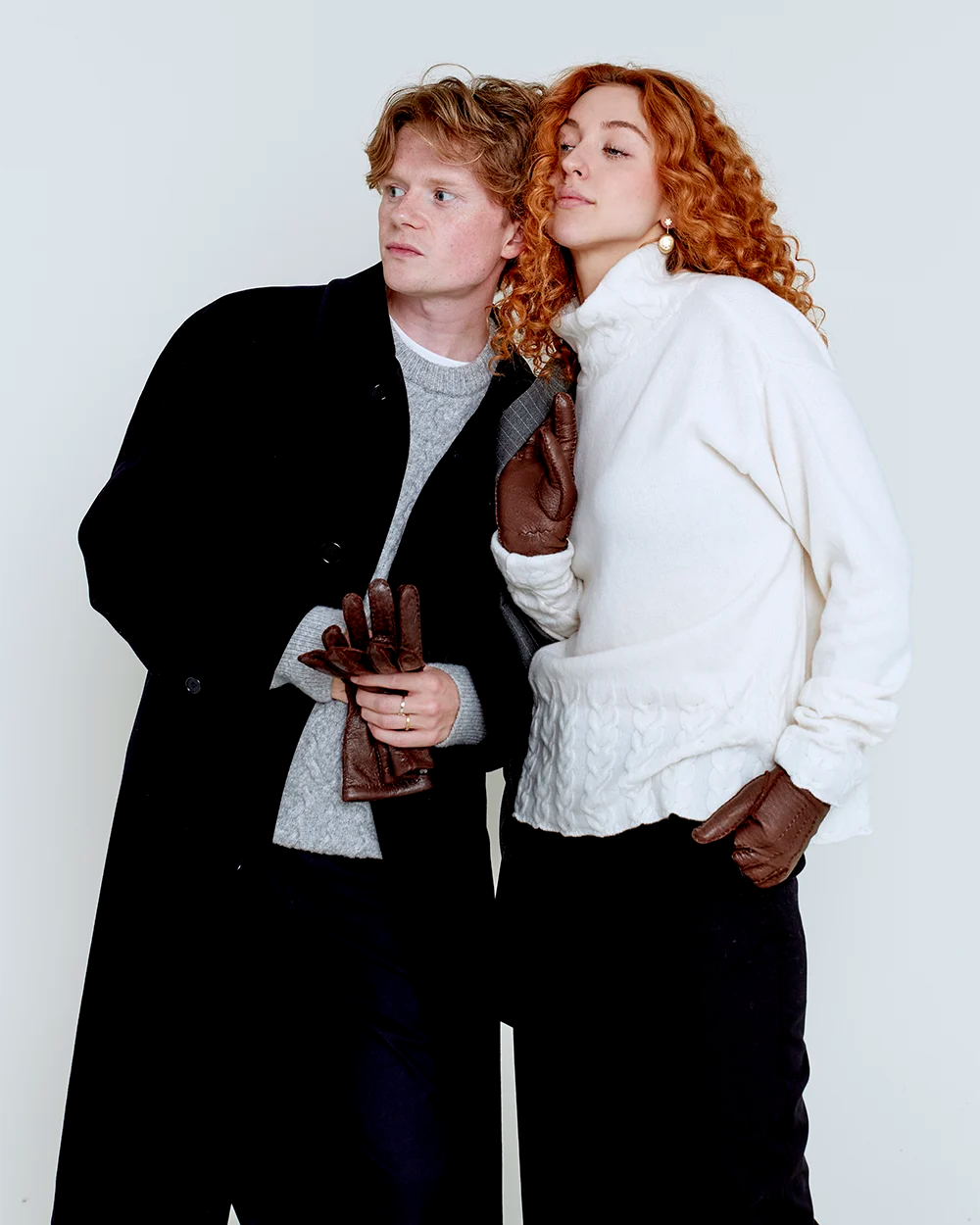 Vores premium damehandsker fra RHANDERS, Anastsia Pearl, er fremstillet i det bløde og mest eksklusive peccary-skind med varm og krøllet perlelamsfor.