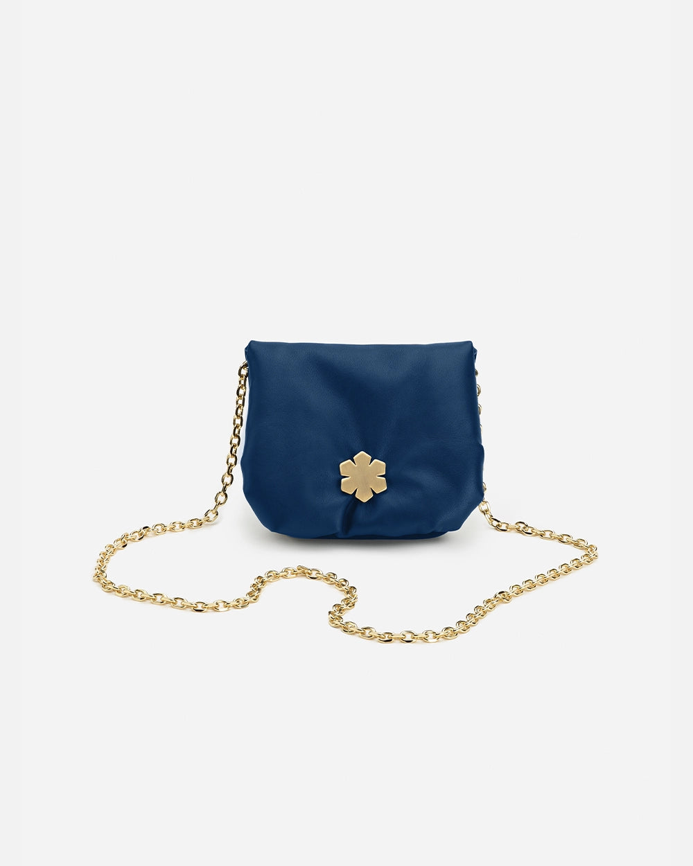 Premium handmade bag crafted from soft glove leather. 14K plated Kalmus feature as part of the elegant magnetic closure. Blue colour