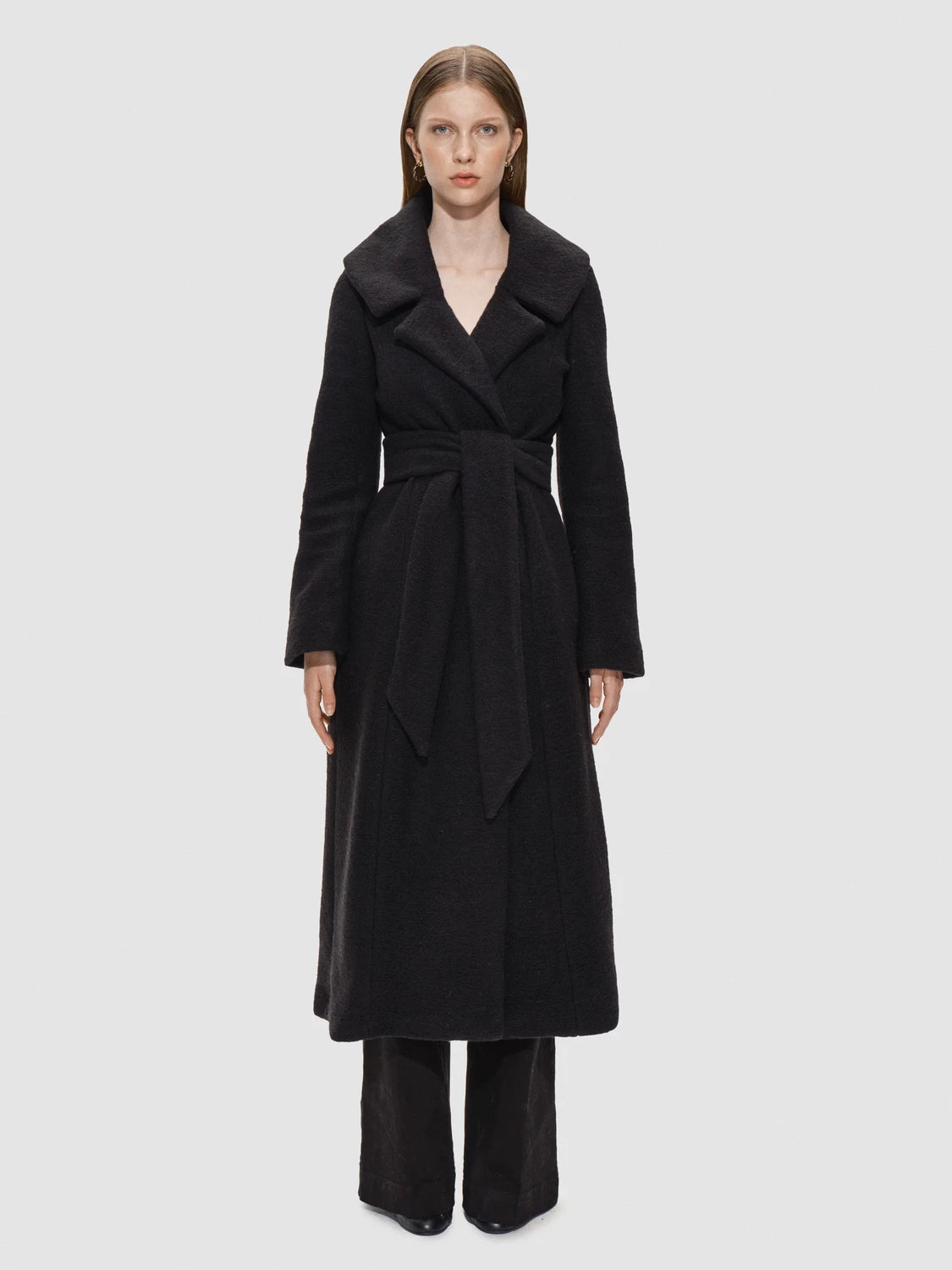 The timeless and functional Robe Coat - Wool from RHANDERS is tailormade from soft, thick wool adorned with 14 karat gold-plated Kalmus flowers.