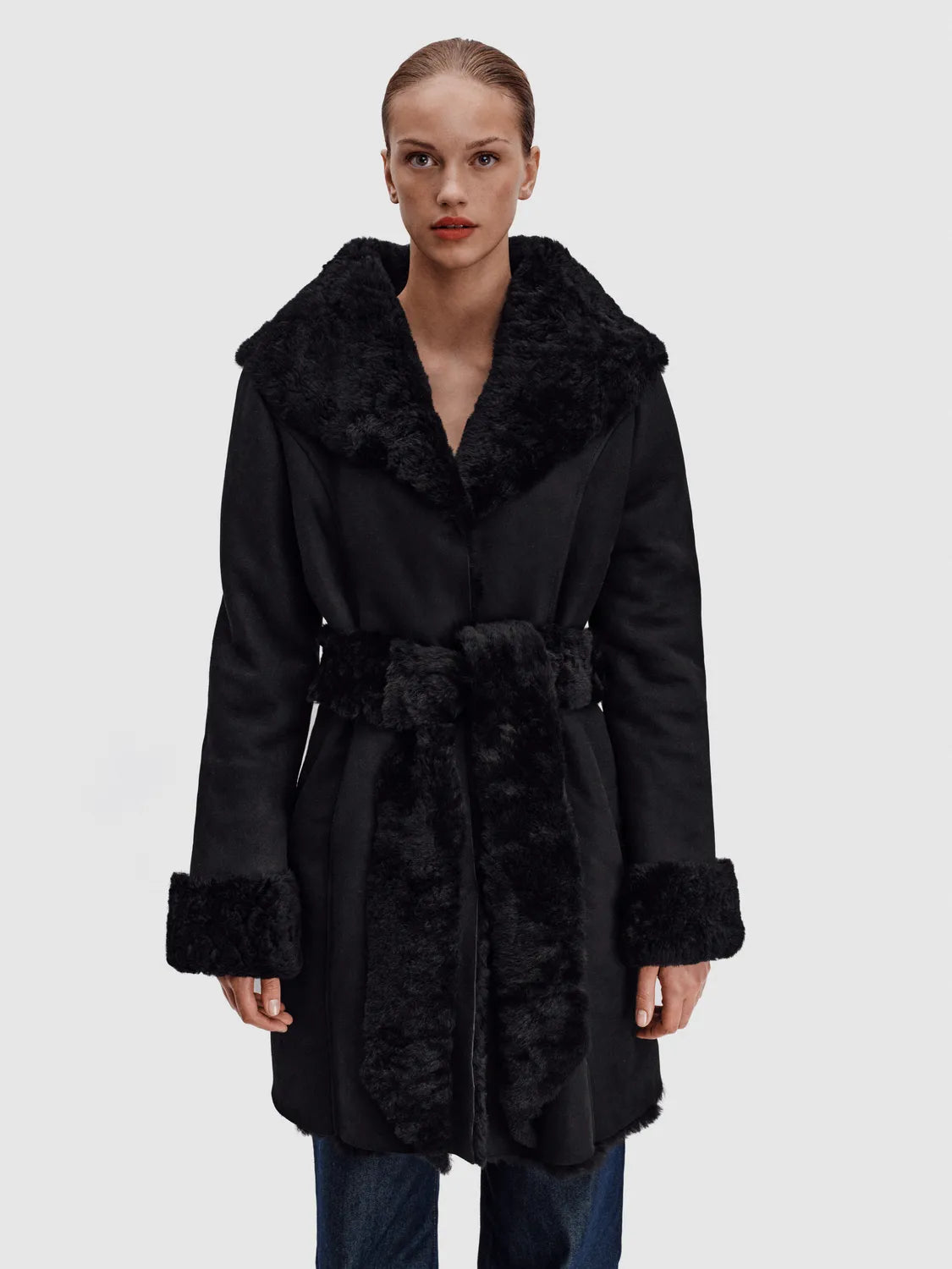 The Robe Coat is handmade from the finest Icelandic shearling adorned with a shearling tie, from RHANDERS.