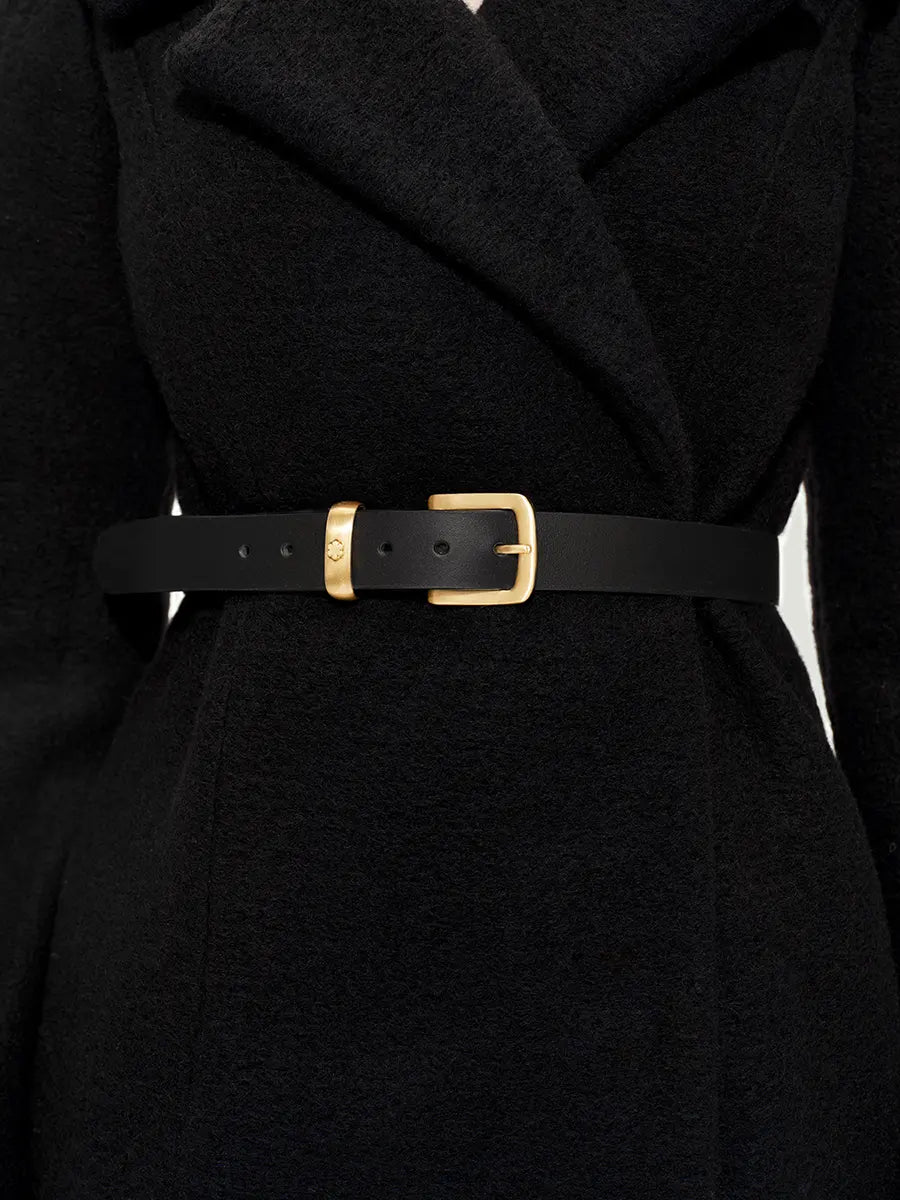 Elegant belt in Italian leather with 14k gold-plated buckle and loop with engraved kalmus flower, made by hand at our RHANDERS atelier in Denmark.