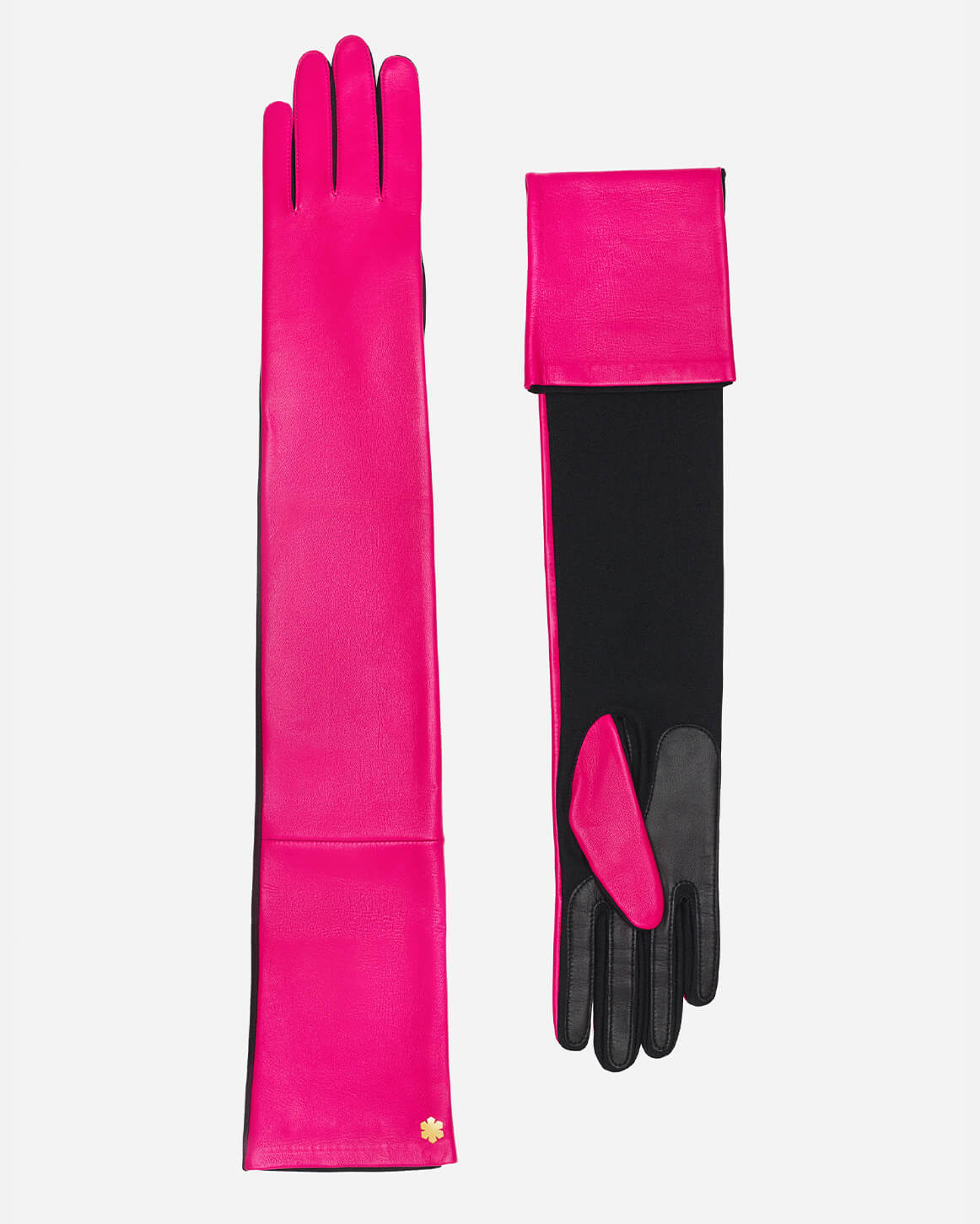 Mød vores “Sophia 16’’ One-size” damekandske i en hot pink edition fra RHANDERS. Disse skulderlange handsker er fremstillet i lammeskind, hvilket giver et blødt touch, prydet med en 14 karat forgyldt Kalmus blomst.