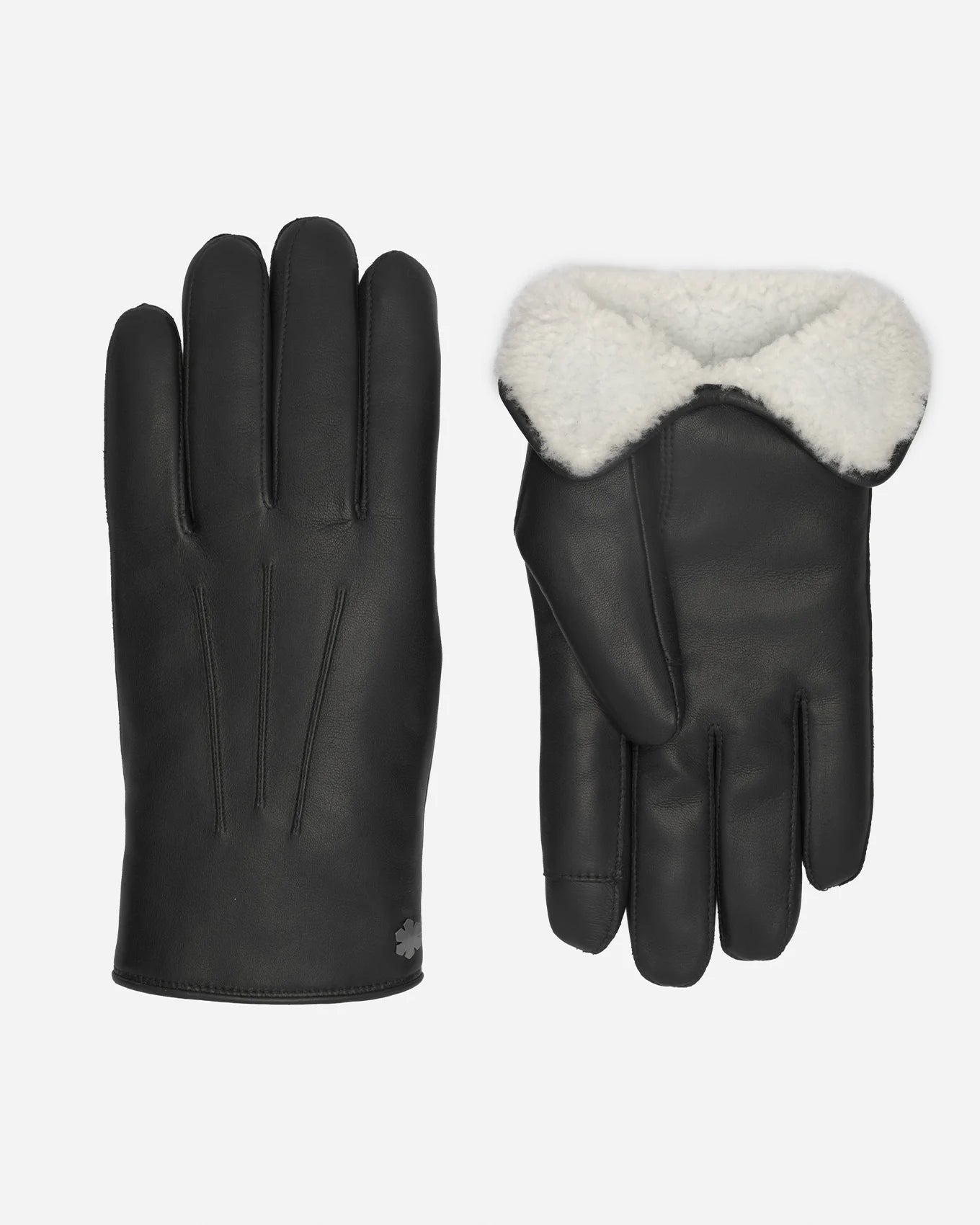 Classic and elegant men’s gloves from RHANDERS, Winston Pearl. The gloves are handcrafted and made from lamb leather, decorated with three points.