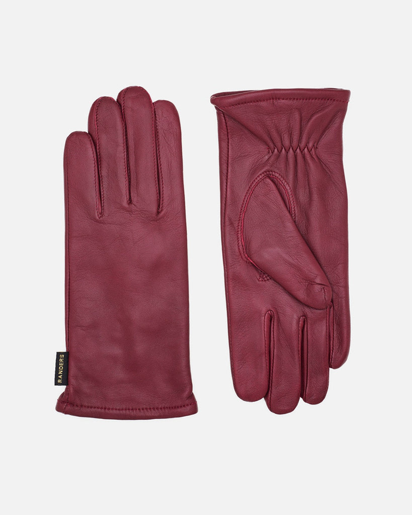 Handcrafted leather gloves for women in the colour wine.