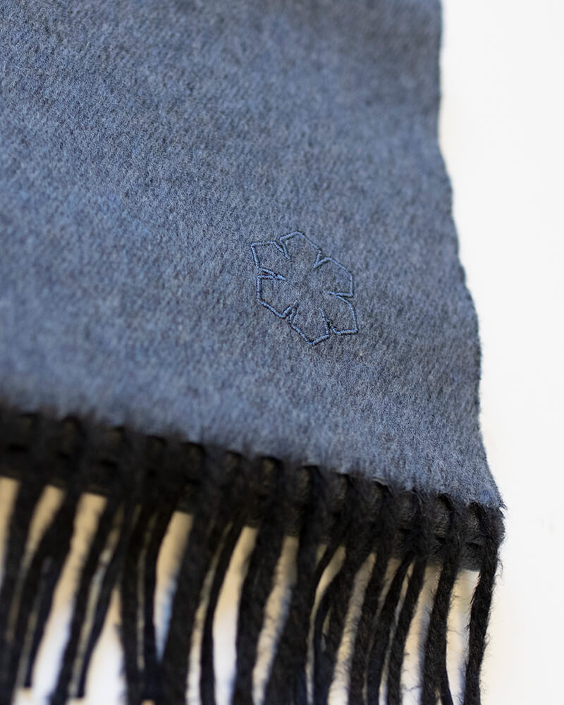 The Churchill Scarf from RHANDERS is made of cashmere and silk and measures 30 x 190 cm.