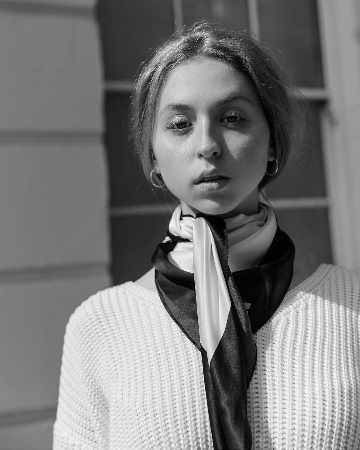 The Aida Scarf is available in two sizes: Small (45 x 45 cm) and Large (90 x 90 cm).