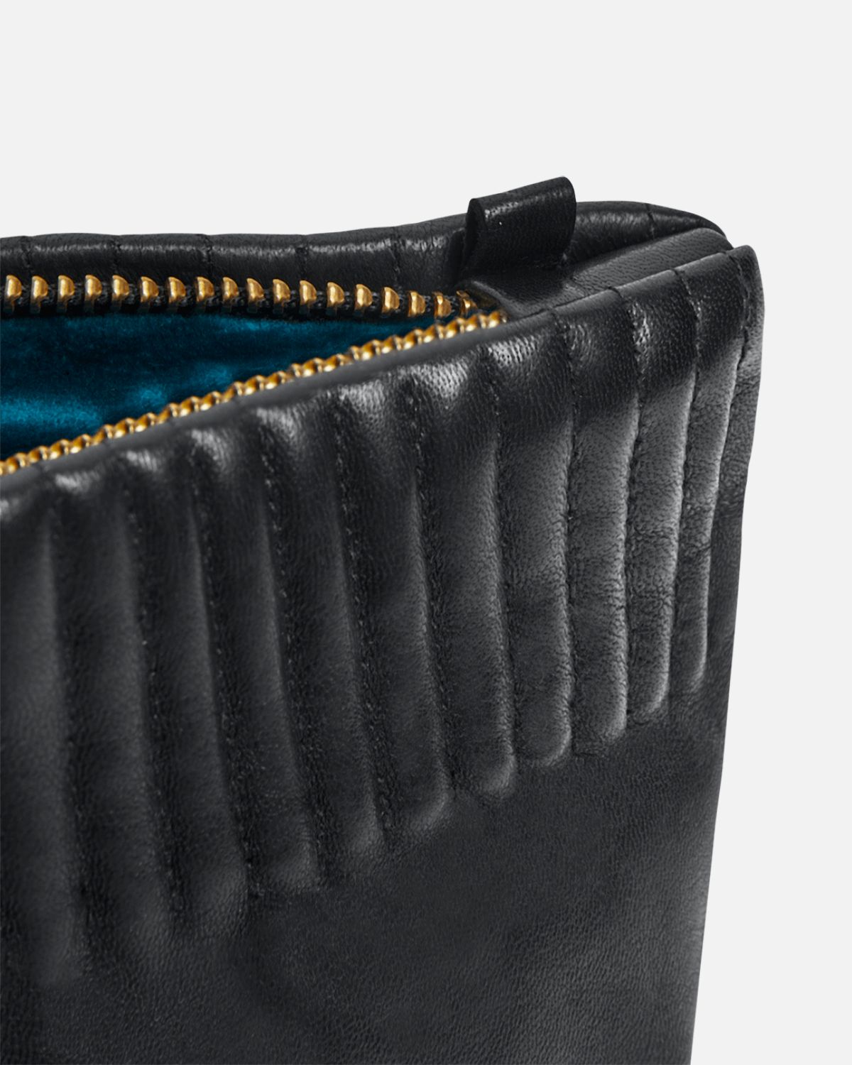 Beautiful and unique pouch from RHANDERS. The top features elastic stitches as per the Cecilia glove – creating a collection coherency around this specific detailing.