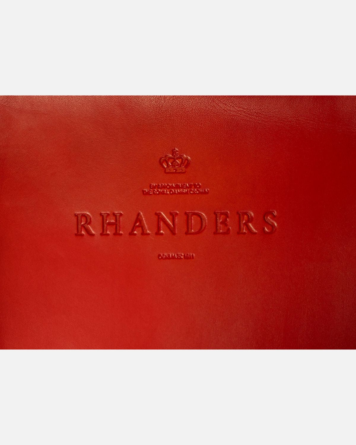 Beautiful and elegant long leather gloves from RHANDERS in the colours red and black