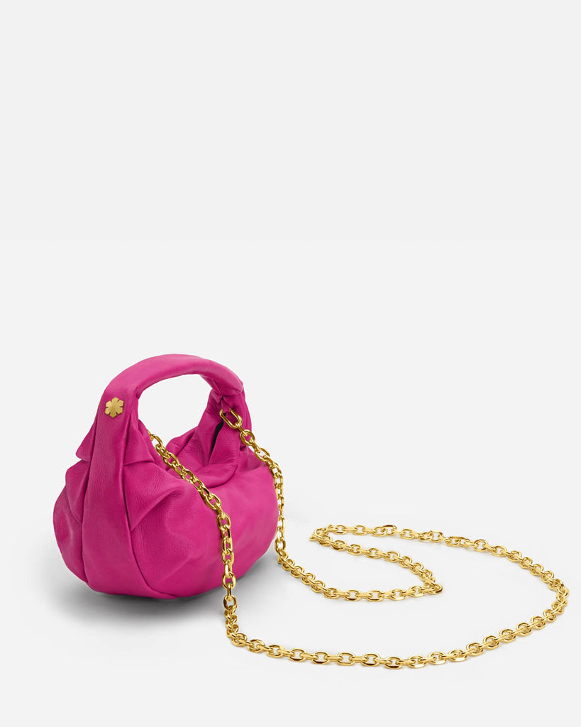 Classic leather bag for women in the colour 'Pink'. Handcrafted from the most exquisite upcycled leather.