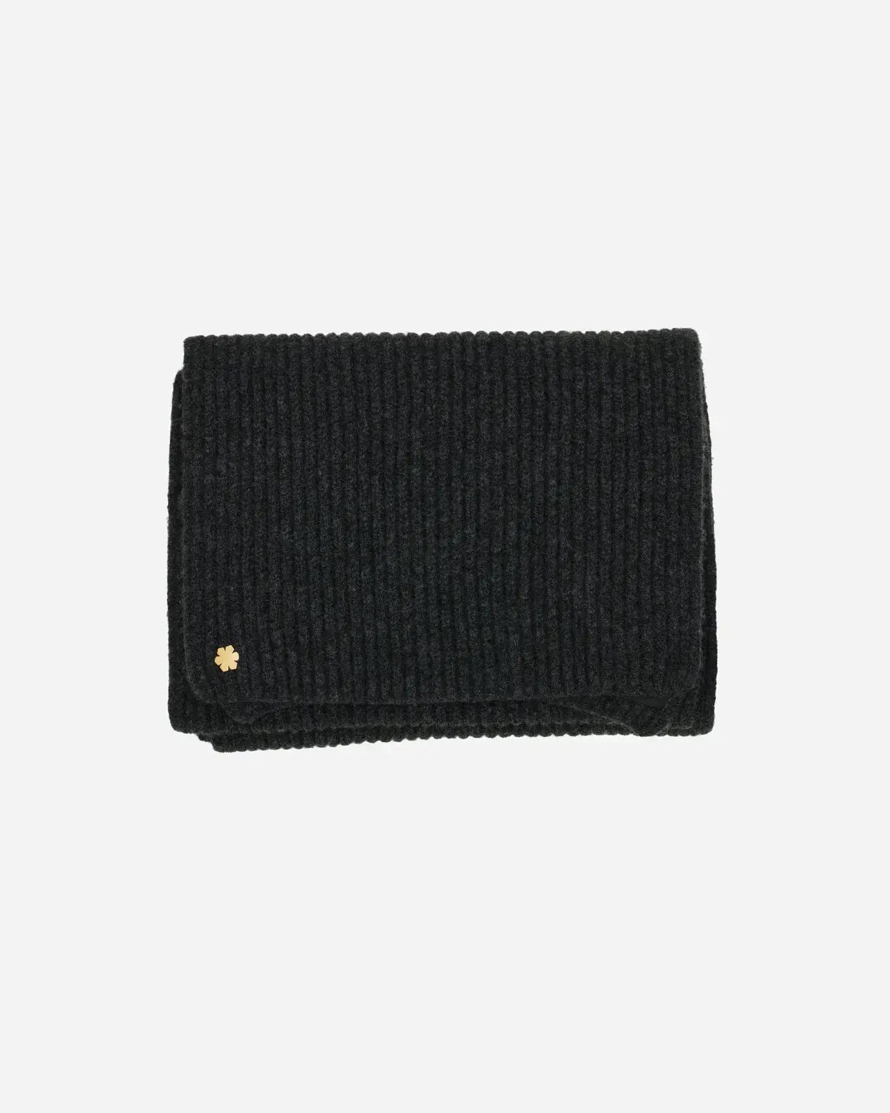 The Alex Scarf in the colour charcoal for women adorned with a 14 karat gold-plated Kalmus flower in one corner.