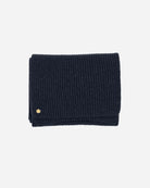 Navy Alex Scarf adorned with a 14 karat gold-plated Kalmus flower in one corner.