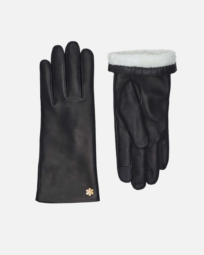 Warm female leather glove with soft curly 'pearl' lamb lining and touch from RHANDERS.