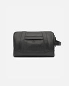 The Crown Toiletry Bag is an exquisite expression of heritage meeting innovation. With its traditional craftsmanship, classic seams, and refined shape, it honours the past – while serving every modern need for travelling in style.