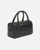 The Crown Handbag is a refined expression of heritage meeting innovation. It celebrates traditional craftsmanship through its classic seams, sculptural shape, and thoughtful construction – all while fulfilling your modern need for understated elegance and effortless functionality.