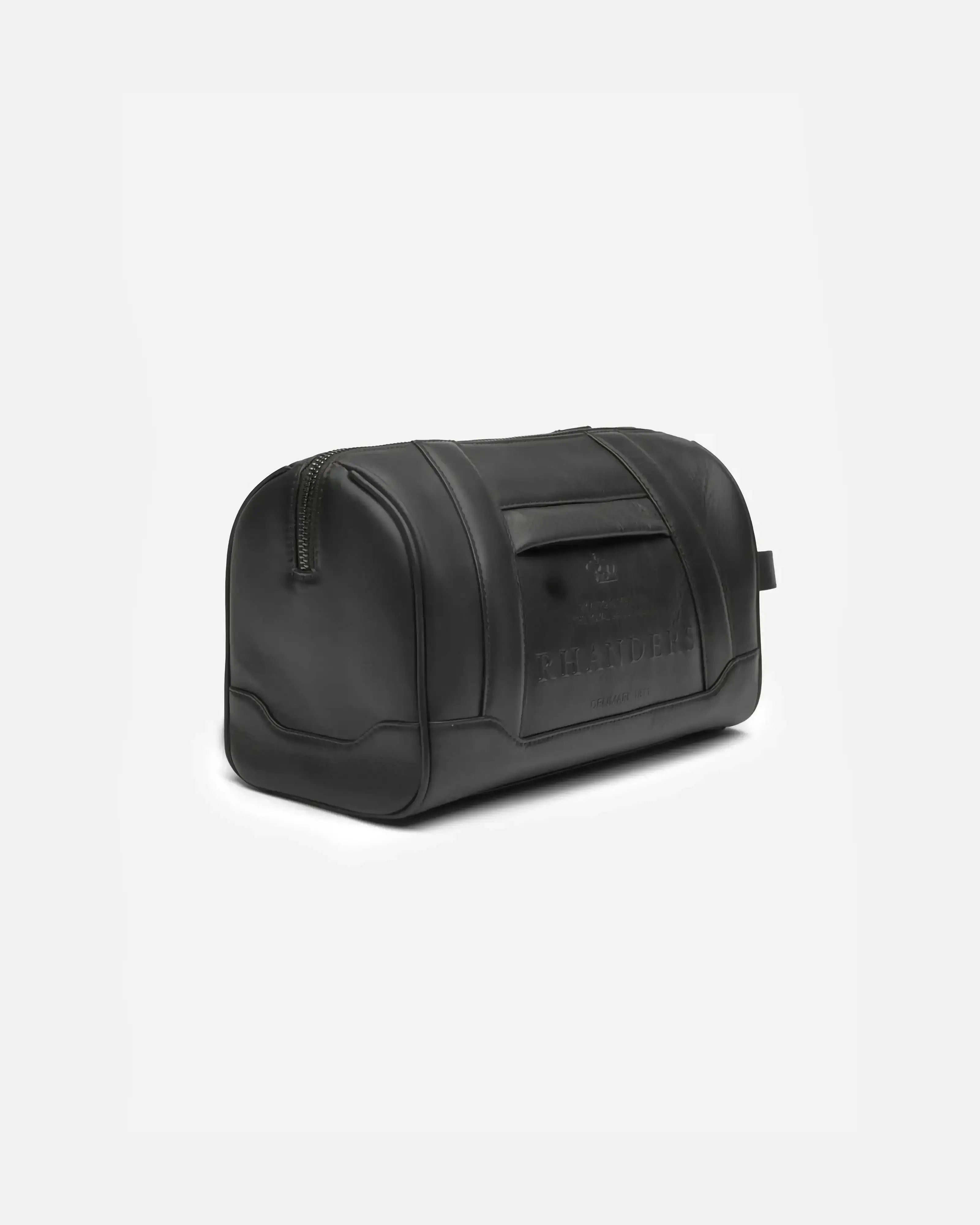 Designed to perfectly complement the Crown Travel Bag, this piece combines form and function effortlessly. It features a spacious main compartment for grooming and beauty essentials, along with practical interior and exterior pockets.