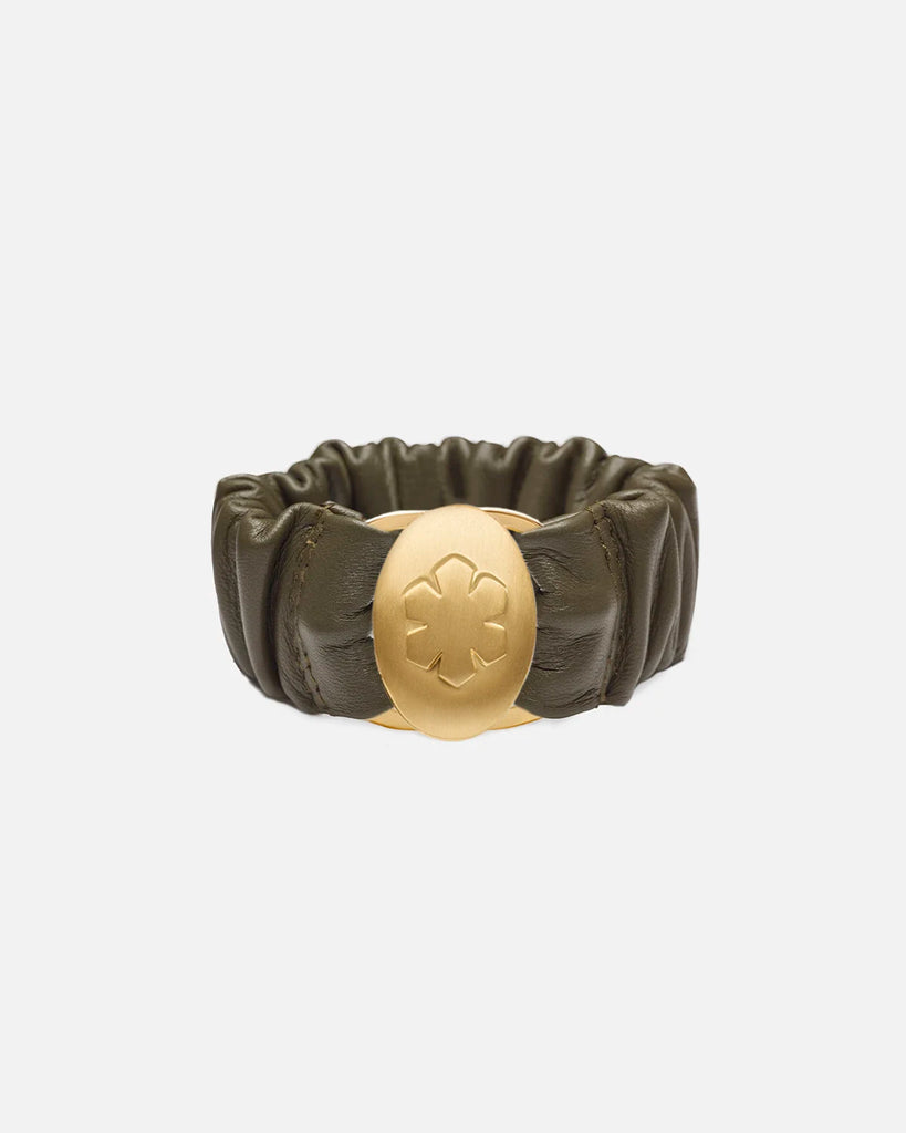 Elegant army colored bracelet in soft lamb leather, decorated with a 14k gold pleated amulet with room for two personal images.