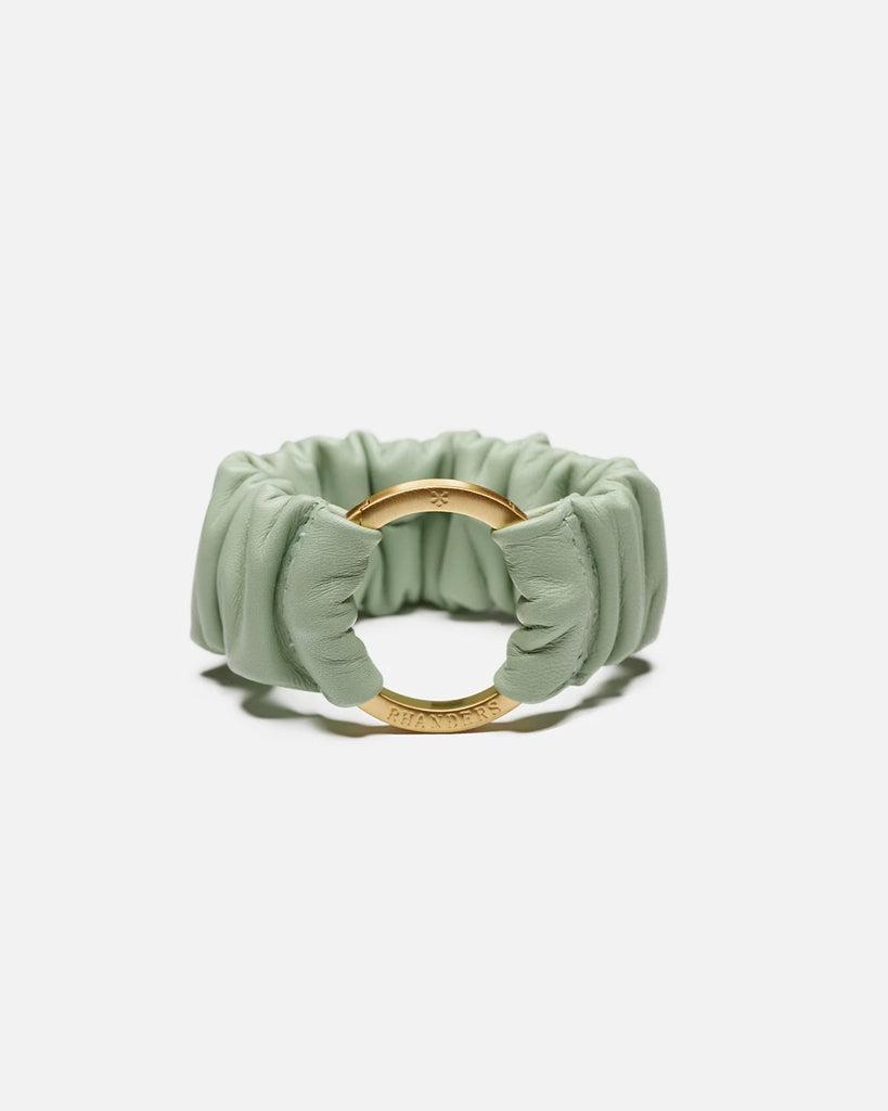 Mint women's bracelet with a gold plated clasp. Made from 100% lamb leather and elasticated for comfortable wear.