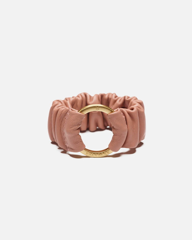 Rose women's bracelet with a gold plated clasp. Made from 100% lamb leather and elasticated for comfortable wear.