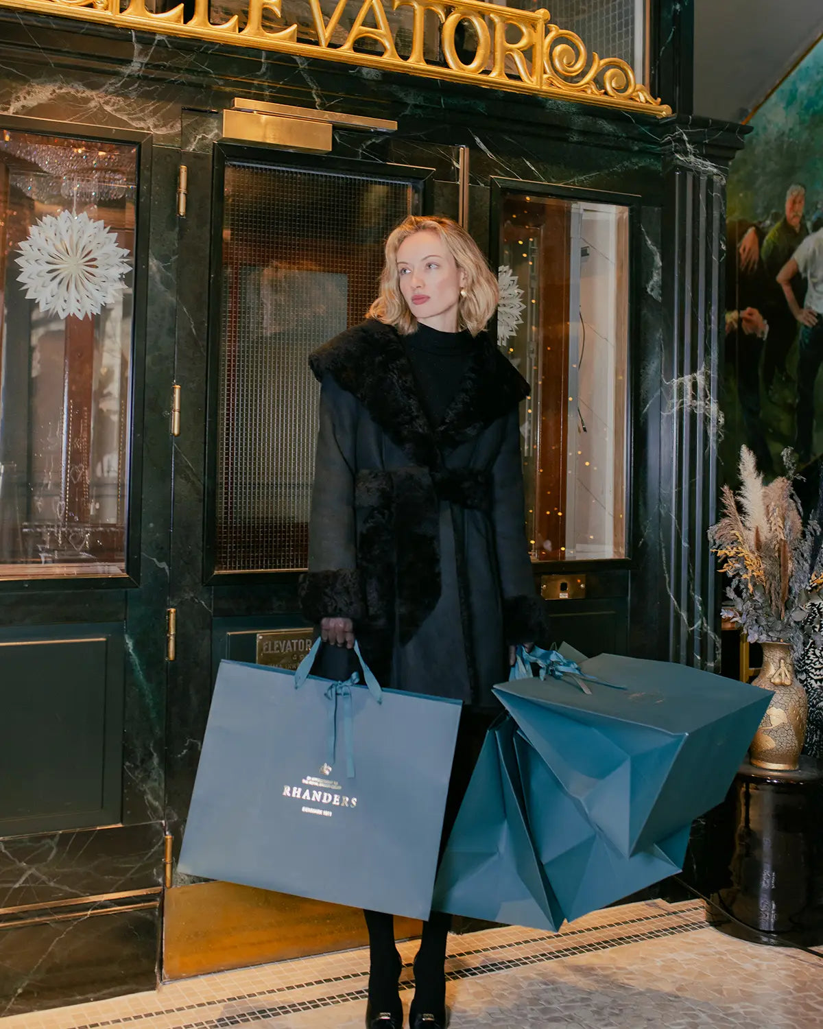 The Helena Robe Coat is crafted from the finest Icelandic shearling, ensuring a luxurious and elegant look, RHANDERS.