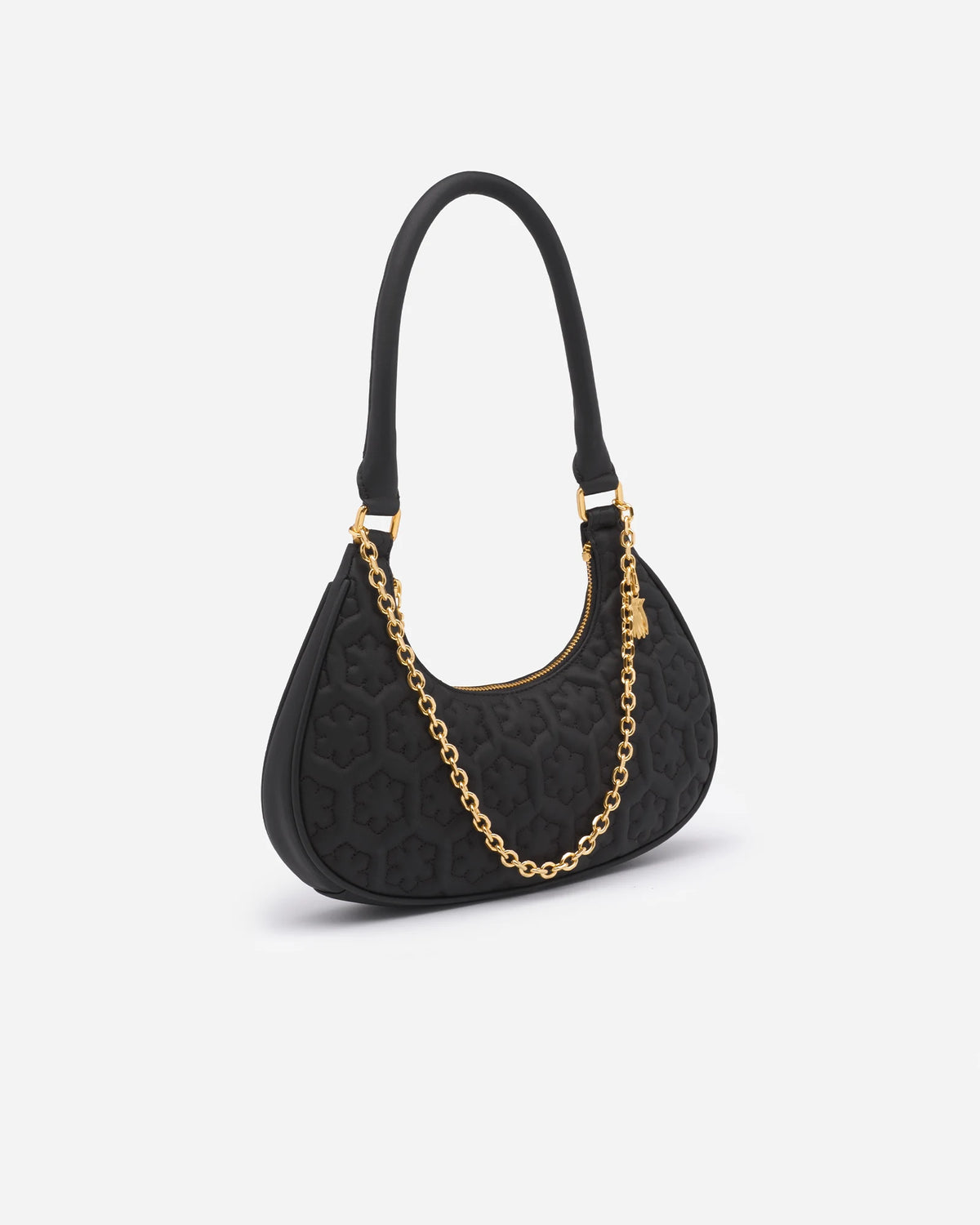 The Isabella Moon Bag from RHANDERS is designed with the signature Kalmus quilting, a soft round handle, and a 14 karat gold-plated zipper. 