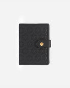 The Isabella Passport Holder from RHANDERS is crafted from the finest lamb leather adorned with Kalmus quilt and a gold-plated Kalmus button.