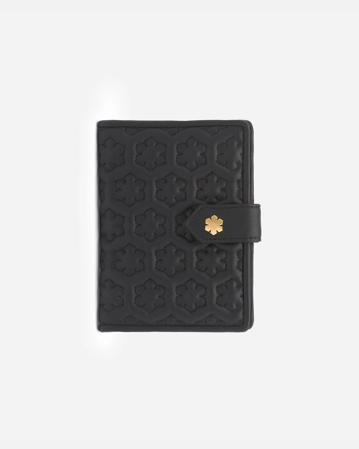 The Isabella Passport Holder from RHANDERS is crafted from the finest lamb leather adorned with Kalmus quilt and a gold-plated Kalmus button.