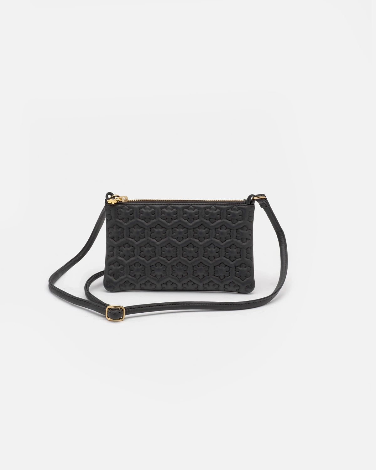 Minimalistic and elegant purse from RHANDERS, the Isabella Purse is adorned with a Kalmus flower pattern and has a adjustable leather shoulder strap.