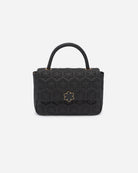 The Isabella Queen Bag is inspired by the Isabella gloves, characterised by the quilted Kalmus pattern and soft leather, RHANDERS.