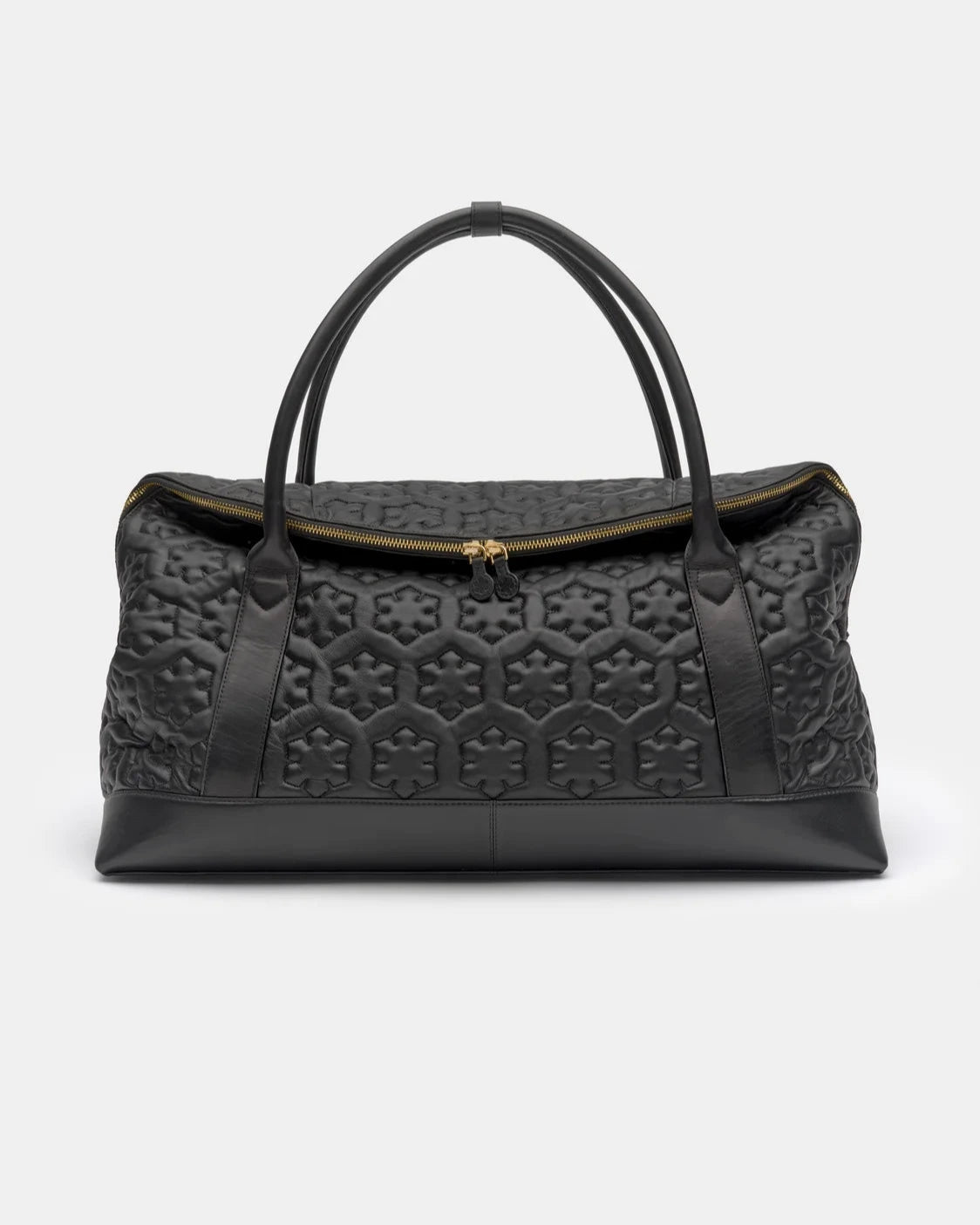 The butter-soft Isabella Travel Bag is made from the finest lamb leather adorned with Kalmus-quilt and stunning gold-plated zipper puller details, RHANDERS.