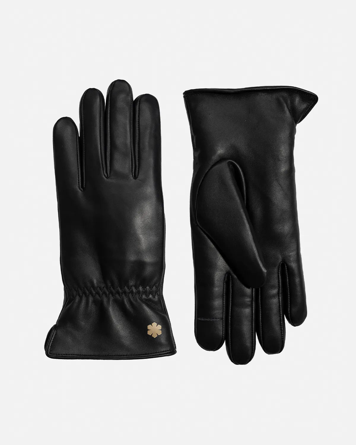 Juliana Shearling from RHANDERS is crafted from semi-aniline lamb leather lined with warm double-faced shearling. Made with inside seams and adorned with a 14 karat gold-plated Kalmus flower.