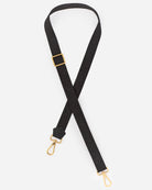 Kalmus Emboss Strap from RHANDERS is a unique shoulder strap adorned with embossed Kalmus flowers into the textile, with gold clasps