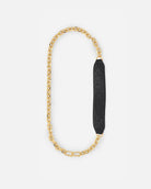 The Kalmus Quilted Shoulder Strap is characterised by its padded leather strap with the signature Kalmus quilting. The strap is finished with a 14 karat gold-plated chain, RHANDERS.
