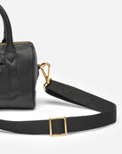 Adjustable shoulder strap from RHANDERS, the Kalmus Emboss Strap is made from textile and butter-soft lamb leather taken the shape of the iconic Kalmus leaf.